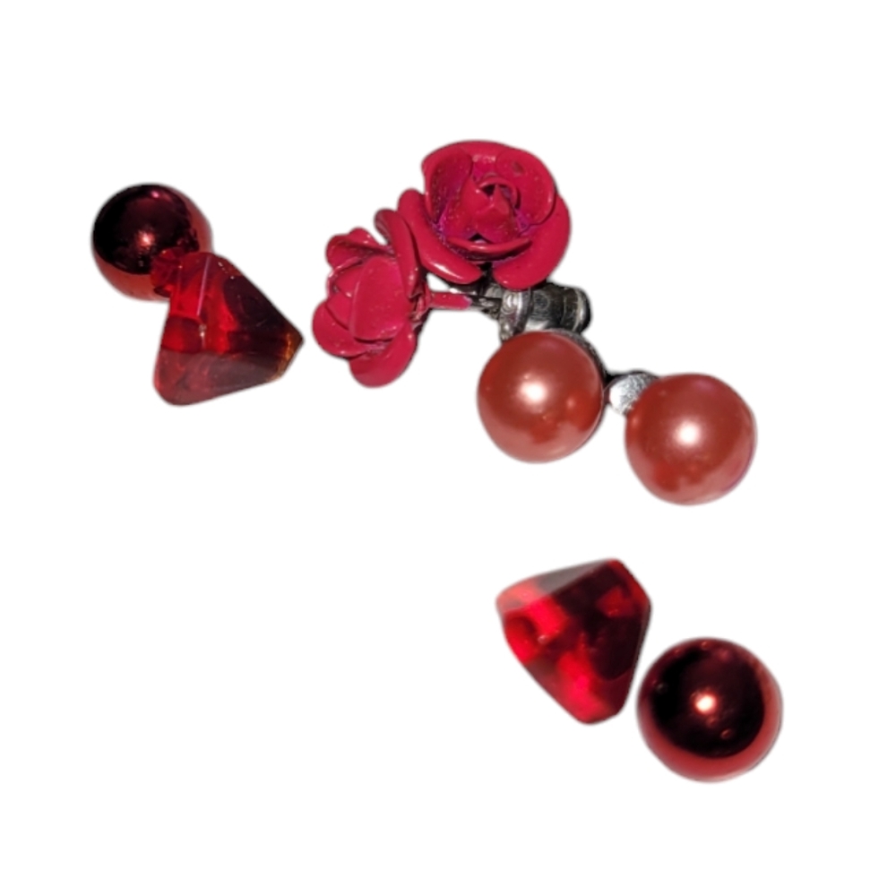 Bundle of four stud earrings